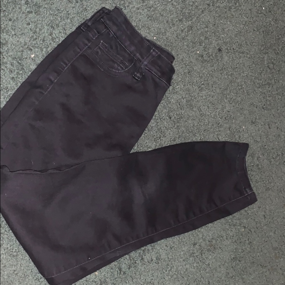 A pair of black jeans that come up to your ankles.